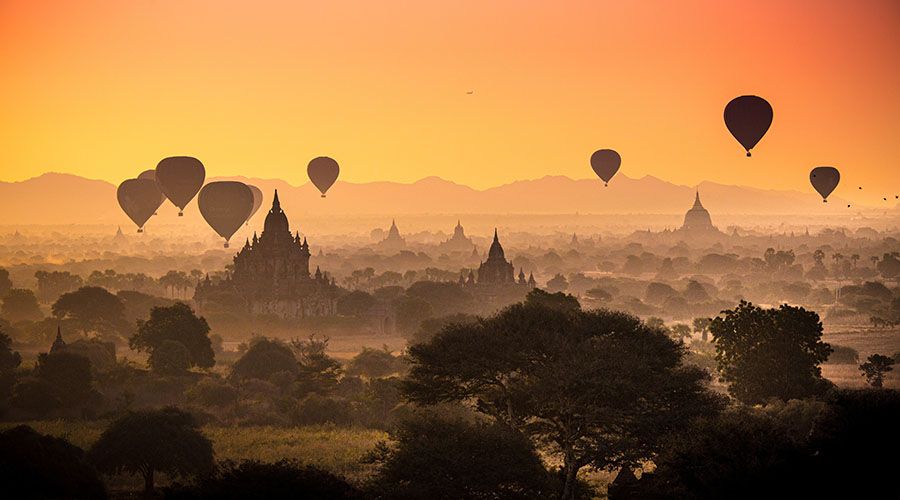 A picture of Myanmar's landscape and hot air balloons.